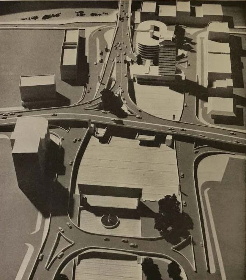 Architectural model showing a complex urban road network with multiple buildings and an interchange.