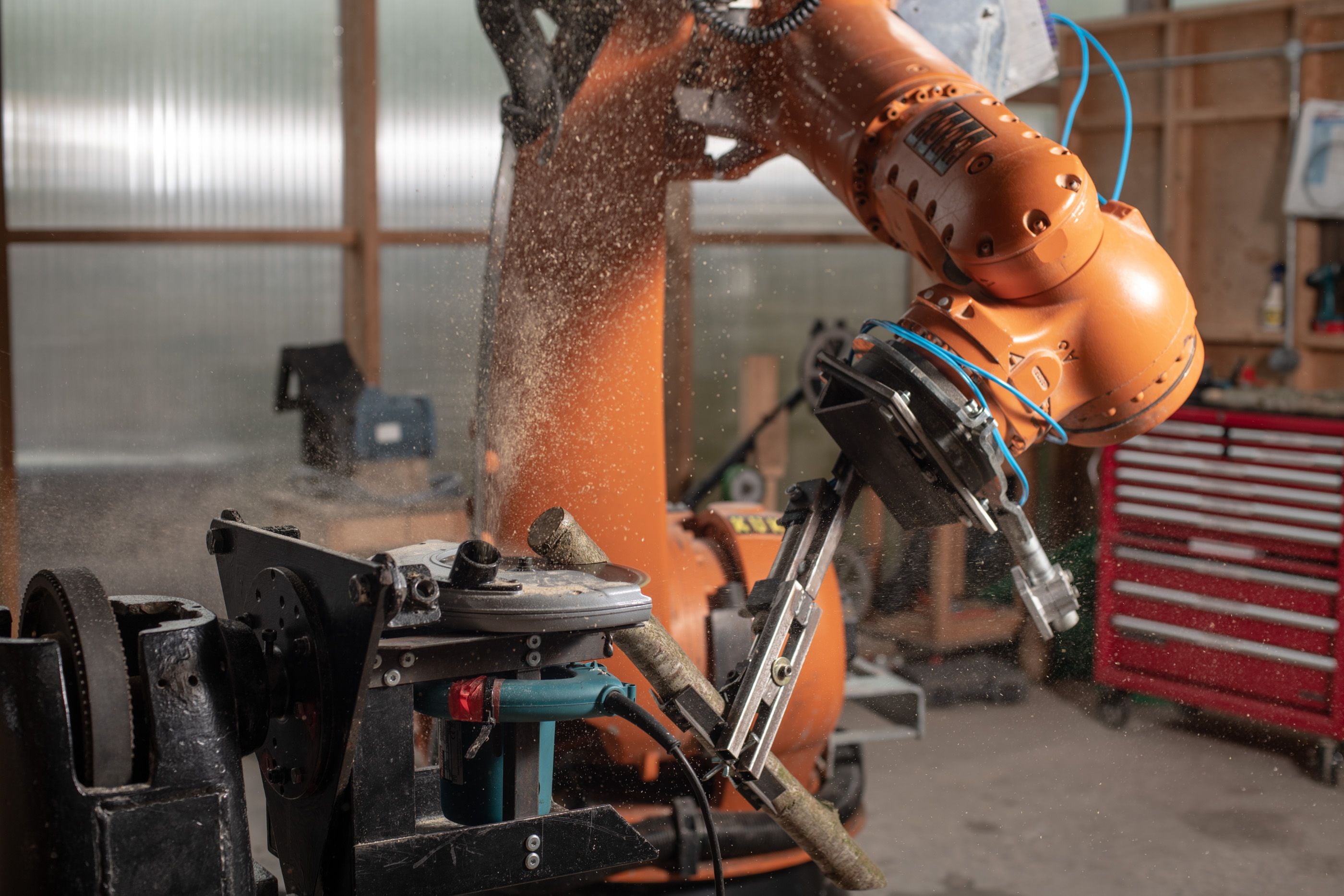 A CNC milling machine in action with a piece of timber